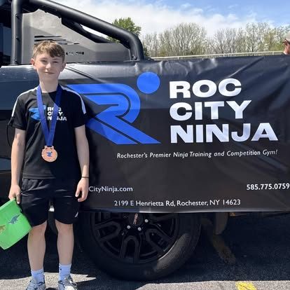 ROC City Ninja athlete with his medal